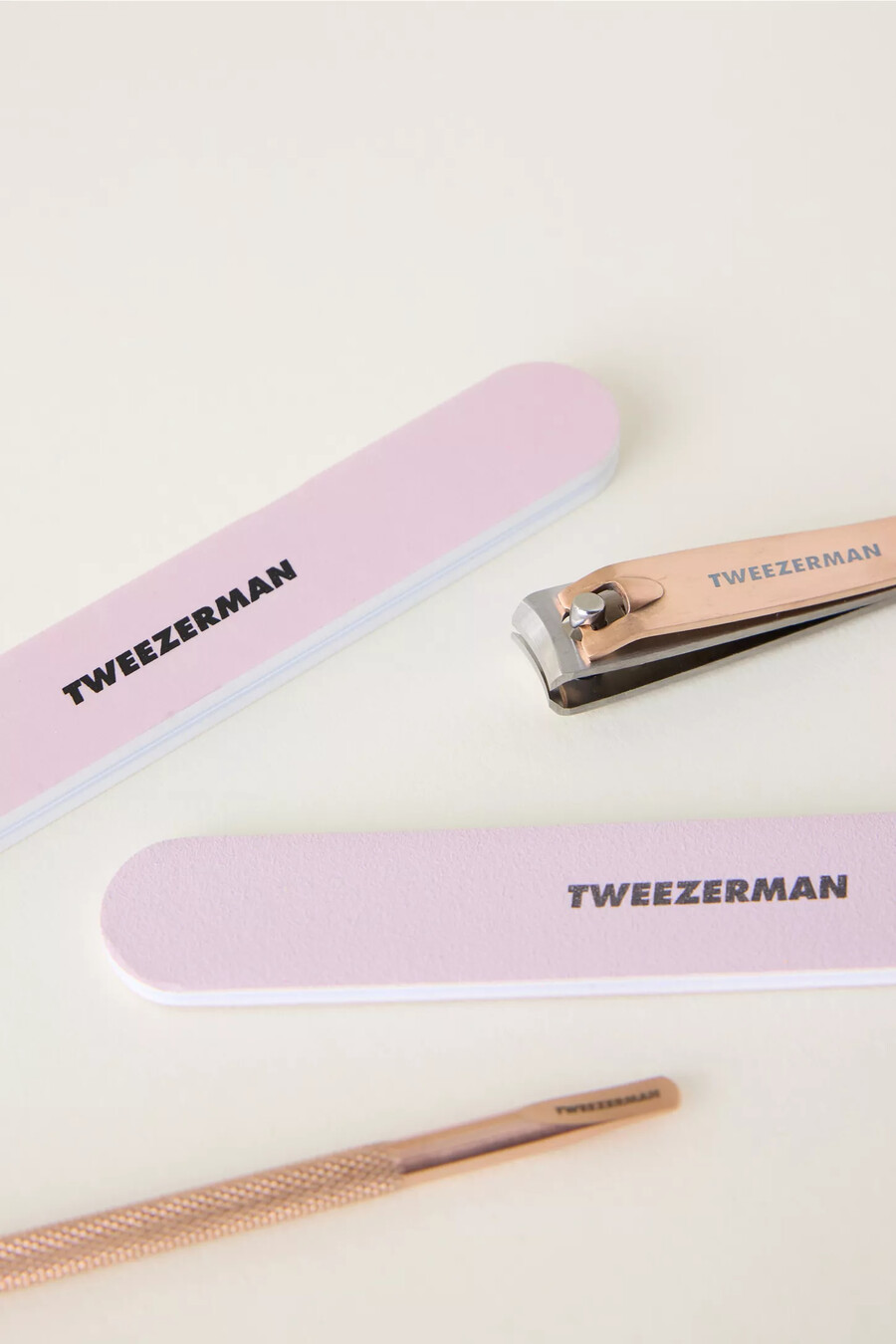 set de manicura tweezerman en oro rosa