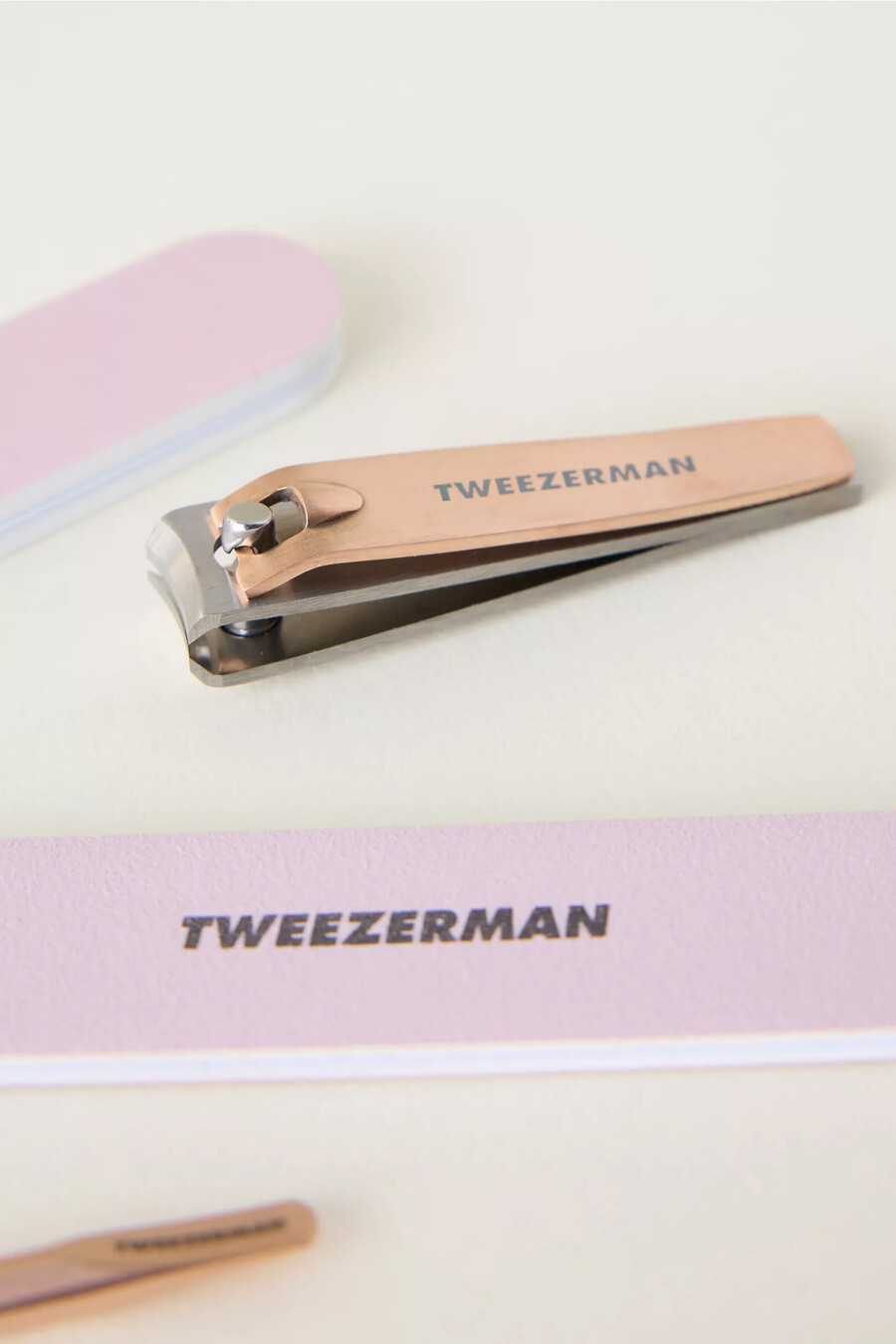 set de manicura tweezerman en oro rosa