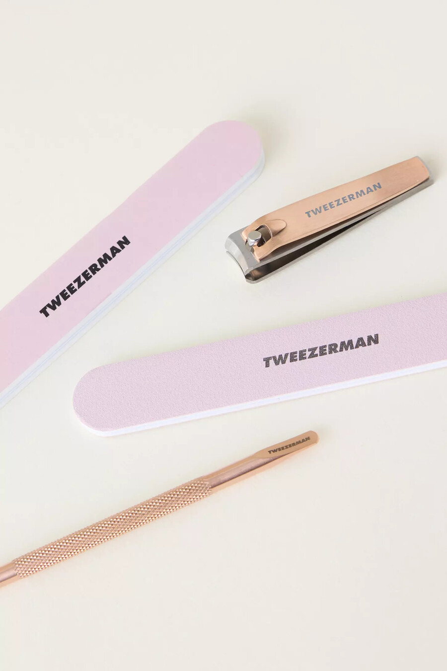 set de manicura tweezerman en oro rosa