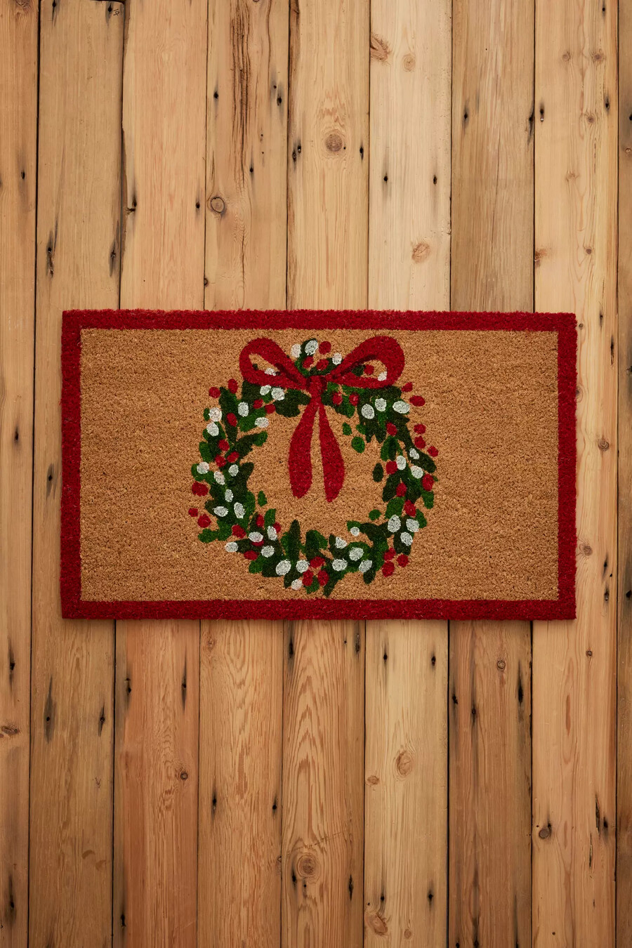 felpudo navideño con coronas de now designs